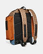 COACH®,RIDGE BACKPACK IN SIGNATURE CANVAS WITH COACH PATCH,Coated Canvas,Large,Black Copper/Khaki,Angle View
