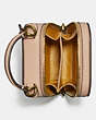 COACH®,COACH X JEAN-MICHEL BASQUIAT ALIE CAMERA BAG,Leather,Mini,Brass/Ivory,Inside View,Top View