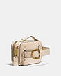 COACH®,COACH X JEAN-MICHEL BASQUIAT ALIE BELT BAG,Leather,Mini,Brass/Ivory,Angle View