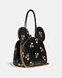 COACH®,DISNEY X COACH MINNIE MOUSE KISSLOCK BAG,Glovetanned Leather,Mini,Brass/Black,Angle View