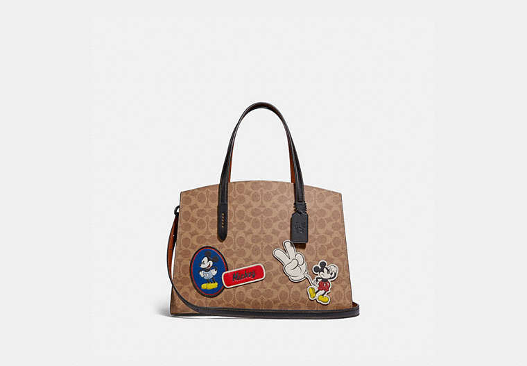 COACH®,DISNEY X COACH CHARLIE CARRYALL IN SIGNATURE CANVAS WITH PATCHES,pvc,Large,Pewter/Tan Black Multi,Front View