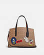 Disney X Coach Charlie Carryall In Signature Canvas With Patches