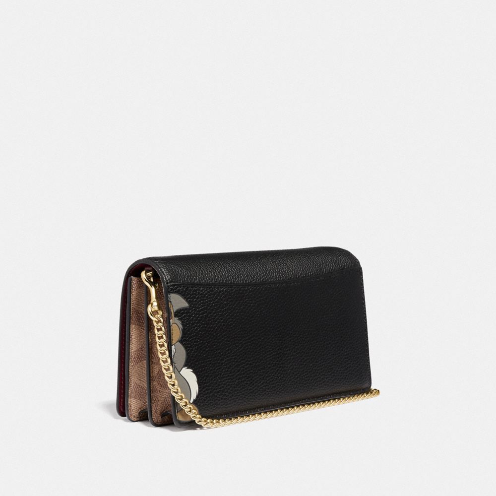 COACH®,DISNEY X COACH CALLIE FOLDOVER CHAIN CLUTCH WITH THUMPER,Leather,Mini,Gold/Black,Angle View