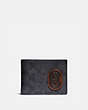 COACH®,SLIM BILLFOLD WALLET IN SIGNATURE CANVAS WITH COACH PATCH,pvc,Charcoal/Sport Blue,Front View