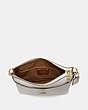 COACH®,DISNEY X COACH KITT MESSENGER CROSSBODY BAG WITH DISNEY MOTIF,Leather,Small,Brass/Chalk,Inside View,Top View