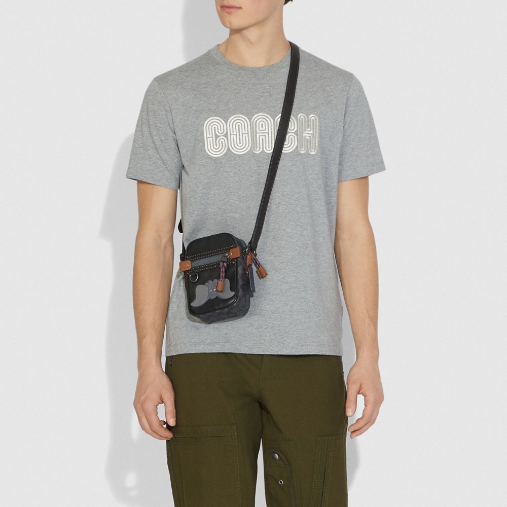 COACH®,Disney X Coach Signature Dylan 10 With Dumbo,,Detail View