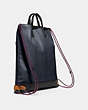 COACH®,ACADEMY DRAWSTRING BACKPACK IN COLORBLOCK,Leather,Medium,Midnight Navy/Black Copper,Angle View