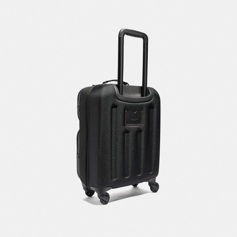 Coach hand store carry luggage