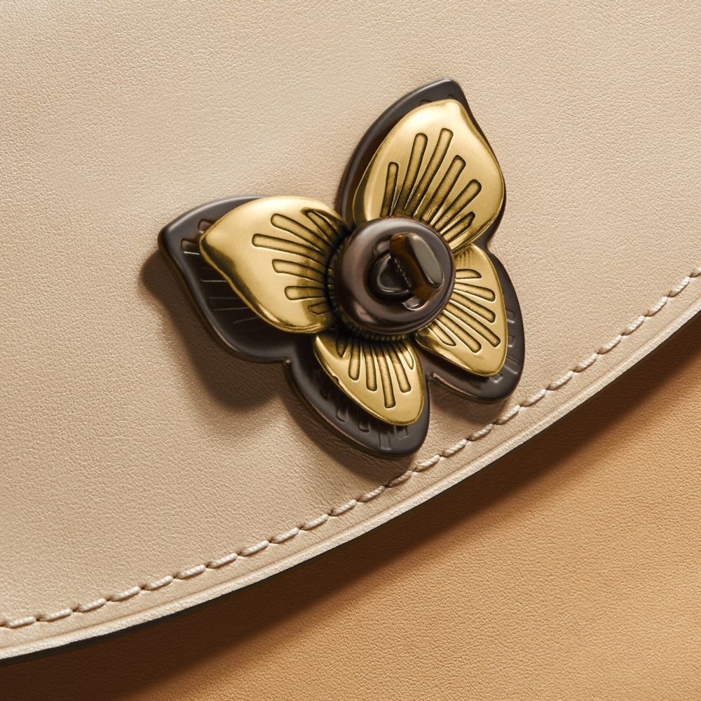 Coach store parker butterfly