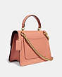 COACH®,PARKER TOP HANDLE WITH BUTTERFLY APPLIQUE,Leather,Medium,Brass/Light Peach,Angle View