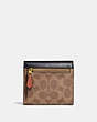 COACH®,SMALL WALLET IN COLORBLOCK SIGNATURE CANVAS,Coated Canvas,Brass/Tan/Ink/Light Peach,Back View