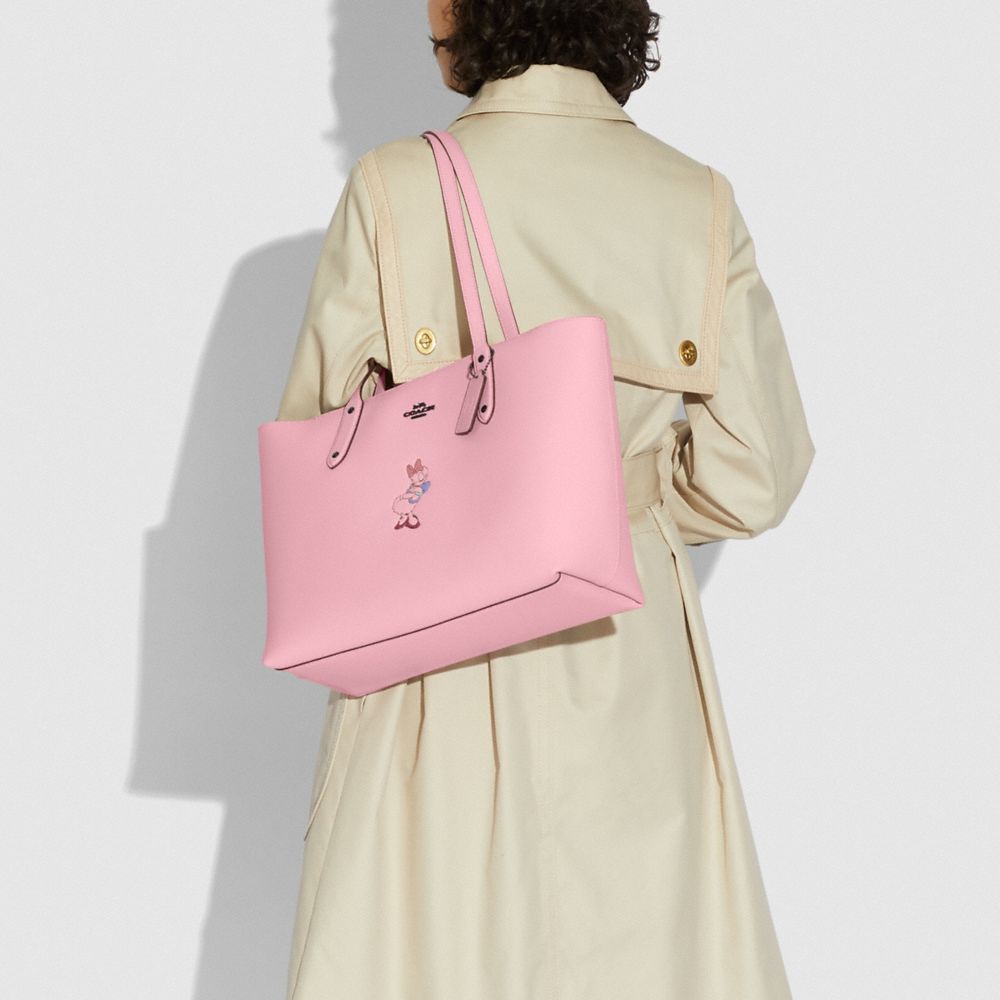 COACH®,Disney X Coach Central Tote With Zip With Daisy Duck Motif,,Detail View