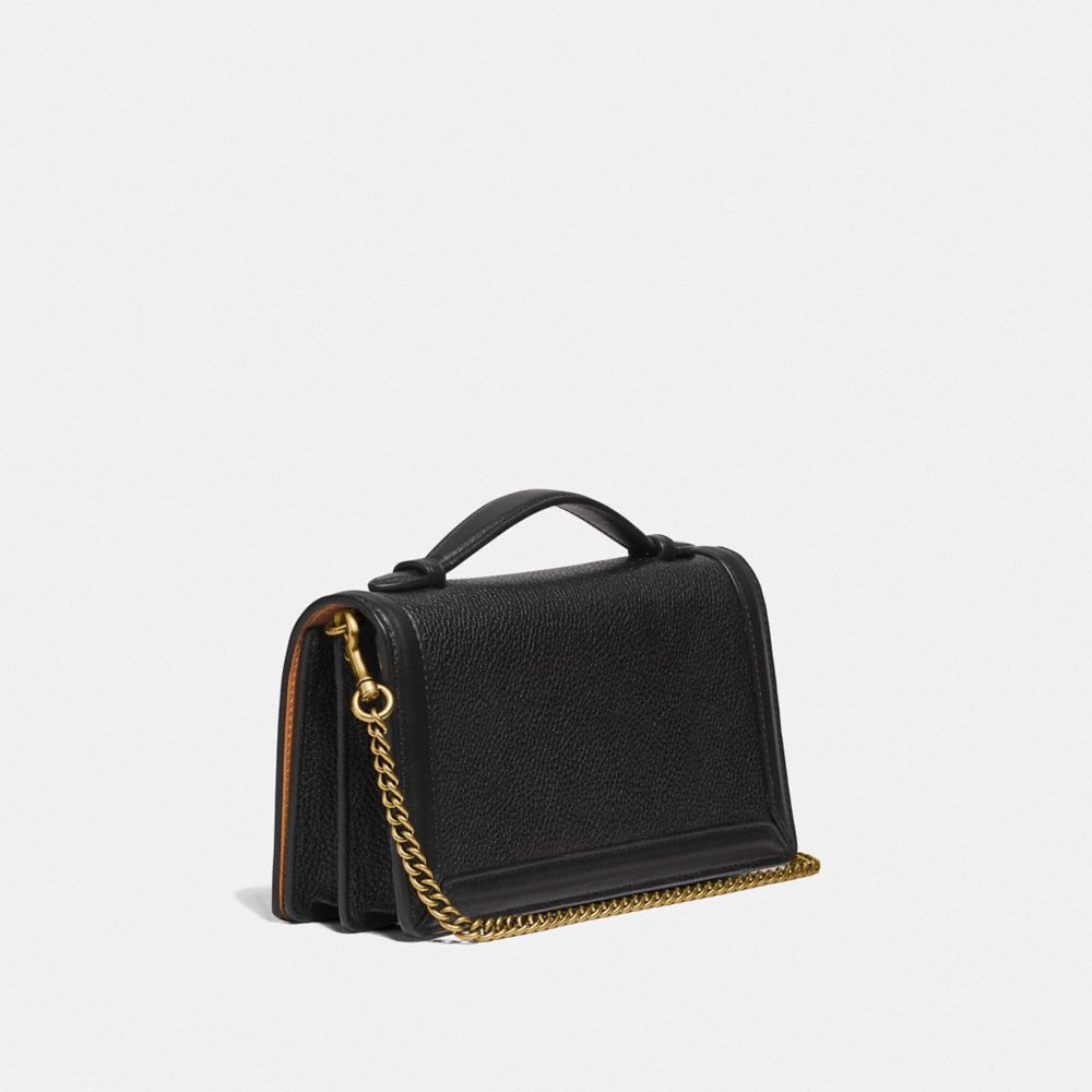 COACH®,RILEY CHAIN CLUTCH,Pebbled Leather,Mini,Brass/Black,Angle View