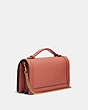 COACH®,RILEY CHAIN CLUTCH,Pebbled Leather,Mini,Brass/Light Peach,Angle View