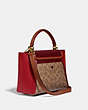 COACH®,COURIER CARRYALL 23 IN COLORBLOCK SIGNATURE CANVAS,pvc,Medium,Brass/Tan Red Apple Multi,Angle View