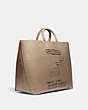 COACH®,COACH X JEAN-MICHEL BASQUIAT ROGUE TOTE 38,Smooth Leather,Large,0I/Elm,Angle View