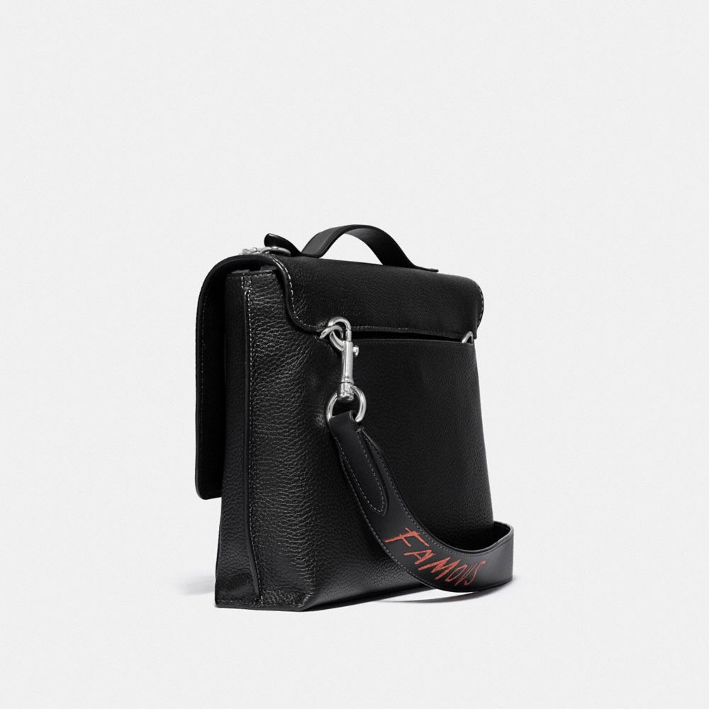 COACH®,COACH X JEAN-MICHEL BASQUIAT ROGUE MESSENGER,Medium,0I/Black,Angle View