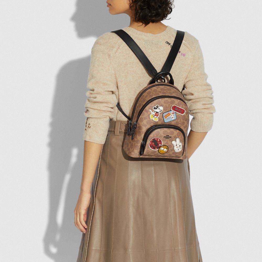 Disney X Coach Carrie Backpack 23 In Signature Canvas With Patches