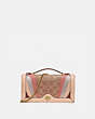 COACH®,RILEY CHAIN CLUTCH IN SIGNATURE CANVAS WITH WAVE PATCHWORK,Coated Canvas,Mini,Brass/Tan Multi,Front View