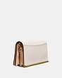 COACH®,CALLIE FOLDOVER CHAIN CLUTCH WITH SCATTERED RIVETS,Leather,Mini,Brass/Chalk Multi,Angle View