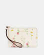 COACH®,CORNER ZIP WRISTLET WITH SPACED WILDFLOWER PRINT,Gold/Chalk Multi,Front View