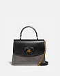 COACH®,PARKER TOP HANDLE WITH BUTTERFLY TURNLOCK AND SNAKESKIN DETAIL,Leather,Medium,Brass/Black Multi,Front View