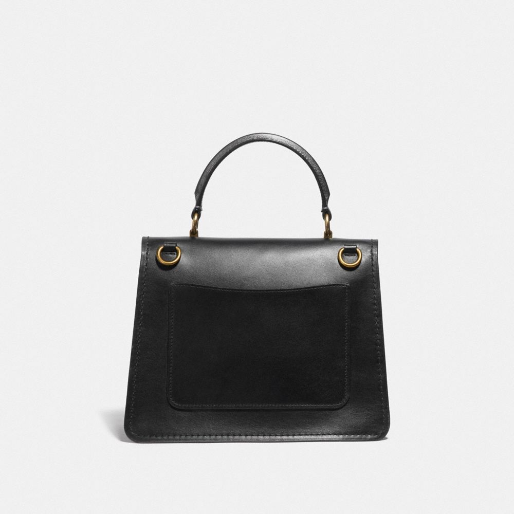 Poignée supérieure Parker avec fermoir papillon et détail peau de serpent