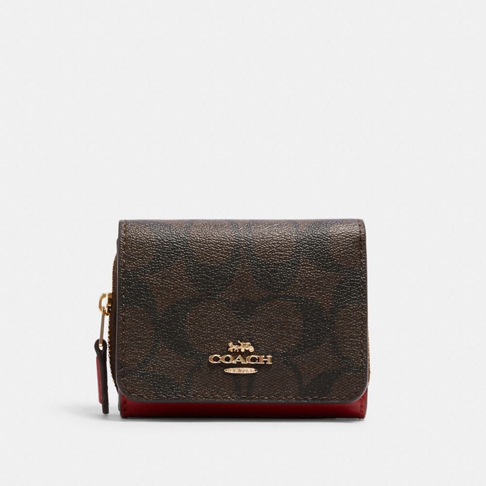 COACH®: Small Trifold Wallet With Floral Bow Print
