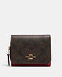 COACH®,SMALL TRIFOLD WALLET IN SIGNATURE CANVAS,pvc,Gold/Brown 1941 Red,Front View
