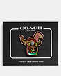 COACH®,REXY PHONE GRIP,Metal,Oil Slick,Angle View