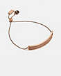 COACH®,PAVE SLIDER BRACELET,Plated Brass,Rose Gold/Peach,Front View