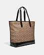 COACH®,ACADEMY TOTE IN SIGNATURE CANVAS,Coated Canvas,X-Large,Black Copper/Khaki,Angle View
