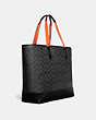 COACH®,ACADEMY TOTE IN SIGNATURE CANVAS WITH COACH PATCH,Coated Canvas,Large,Black Copper/Charcoal,Angle View