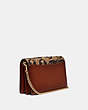 COACH®,CALLIE FOLDOVER CHAIN CLUTCH IN SIGNATURE CANVAS WITH REXY BY GUANG YU,pvc,Mini,Brass/Tan/Rust,Angle View