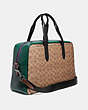 COACH®,METROPOLITAN SOFT CARRYALL IN SIGNATURE CANVAS WITH COACH PATCH,Coated Canvas,Black Copper/Khaki,Angle View
