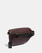 COACH®,BELT BAG WITH REXY BY YETI OUT,Leather,Pewter/Oxblood,Angle View