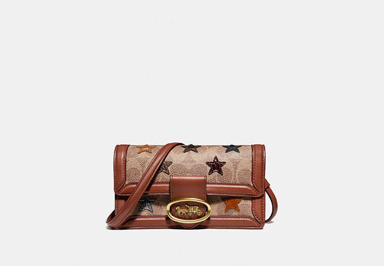 Riley Convertible Belt Bag In Signature Canvas With Star Applique And Snakeskin Detail