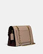 COACH®,PARKER WITH SCALLOP RIVETS,Smooth Leather,Medium,Brass/Stone Multi,Angle View
