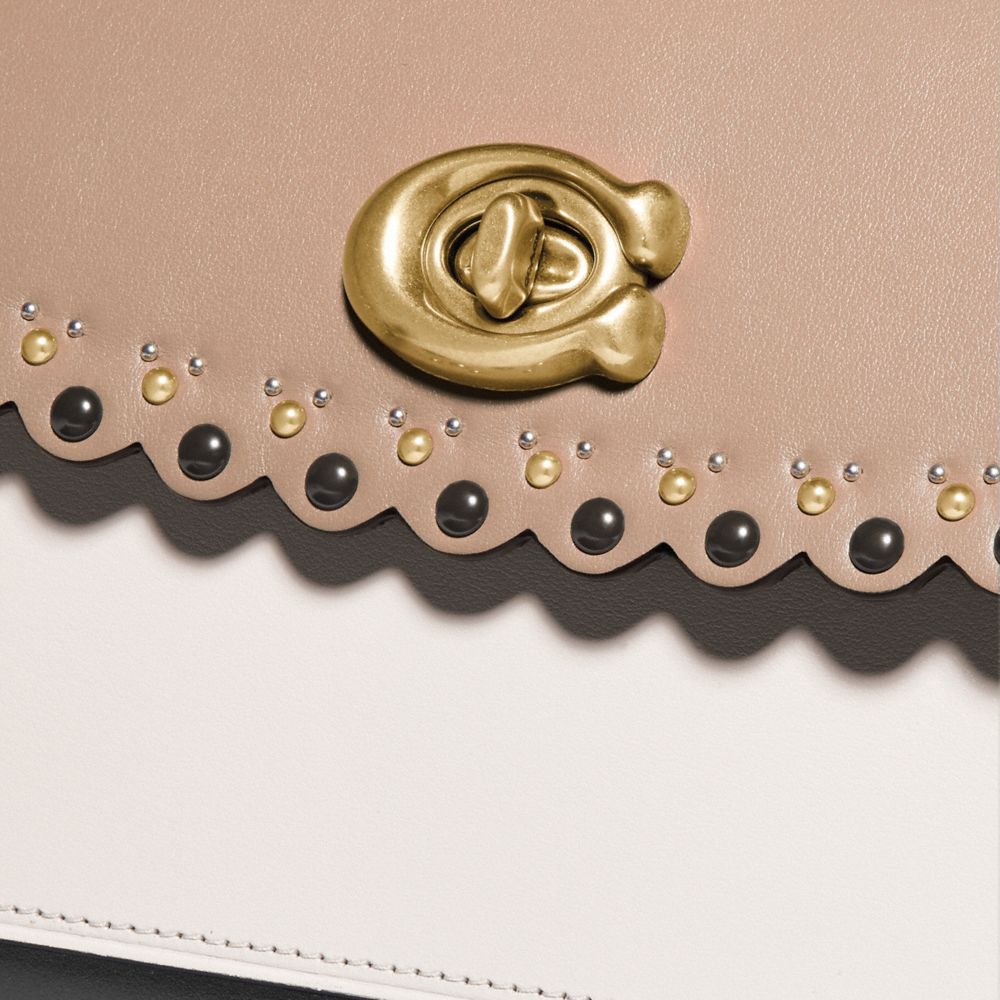 Coach parker discount with scallop rivets