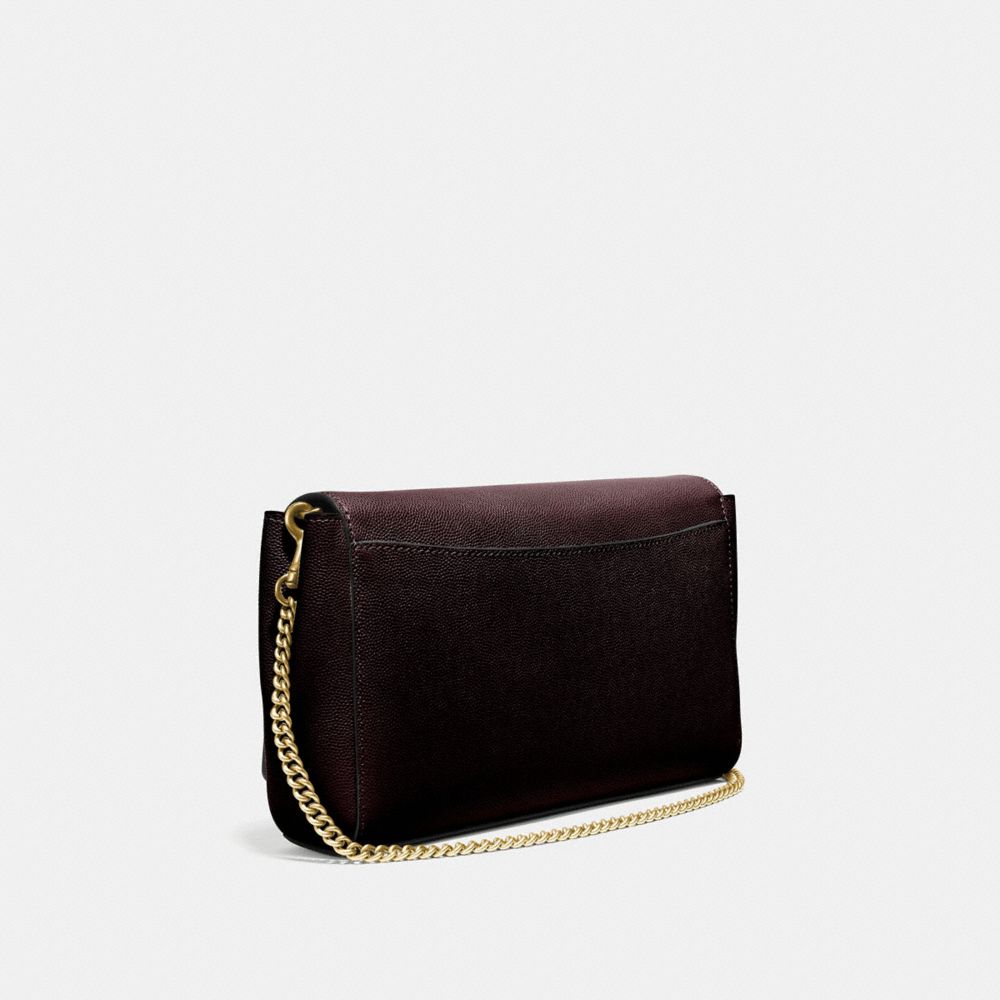 Coach alexa turnlock hot sale clutch in smooth leather