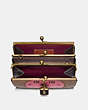 COACH®,DOUBLE FRAME BAG IN SIGNATURE CANVAS WITH REXY BY YETI OUT,pvc,Medium,Brass/Tan/Oxblood,Inside View,Top View
