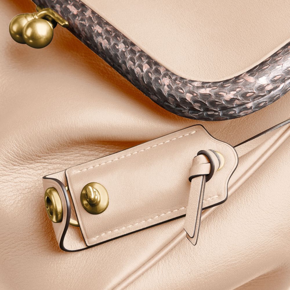 COACH® | Rider Bag 24 With Snakeskin Detail