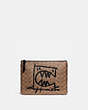 COACH®,POUCH 30 IN SIGNATURE CANVAS WITH REXY BY GUANG YU,Coated Canvas,KHAKI,Front View