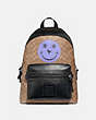 COACH®,ACADEMY BACKPACK IN SIGNATURE CANVAS WITH REXY BY YETI OUT,Coated Canvas,Black Copper/Khaki,Front View