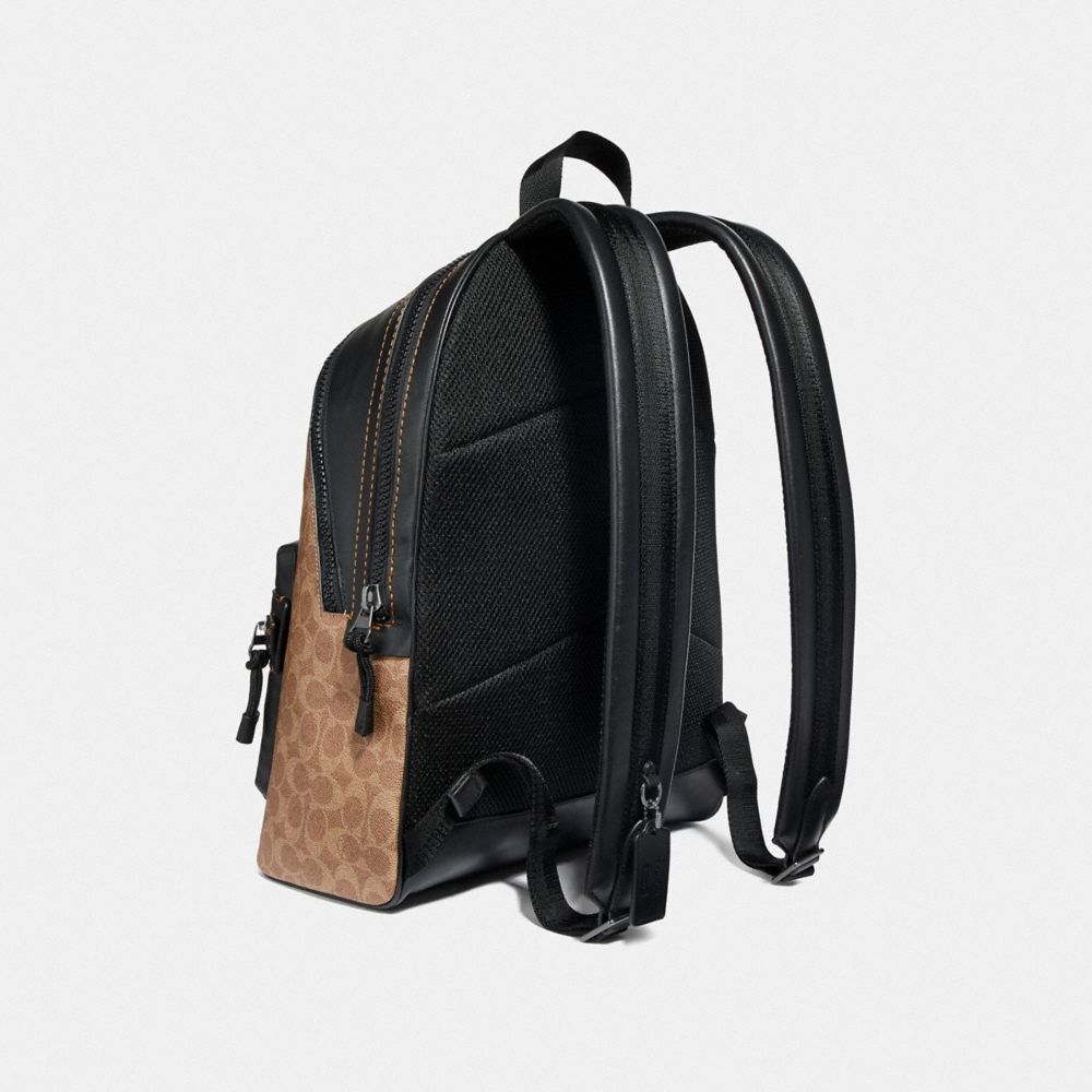 COACH®,ACADEMY BACKPACK IN SIGNATURE CANVAS WITH REXY BY YETI OUT,Coated Canvas,Black Copper/Khaki,Angle View