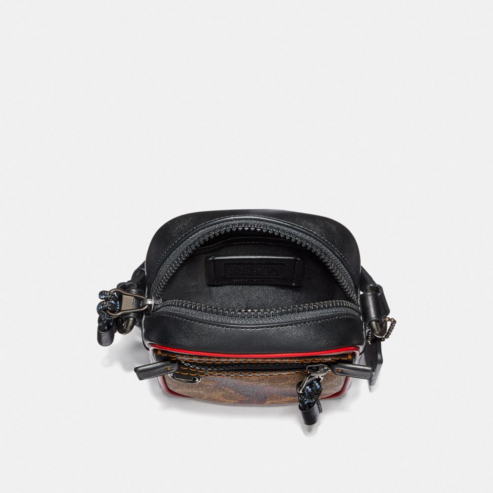 COACH®,Dylan 10 In Signature Canvas With Rexy By Sui Jianguo,,Inside View,Top View