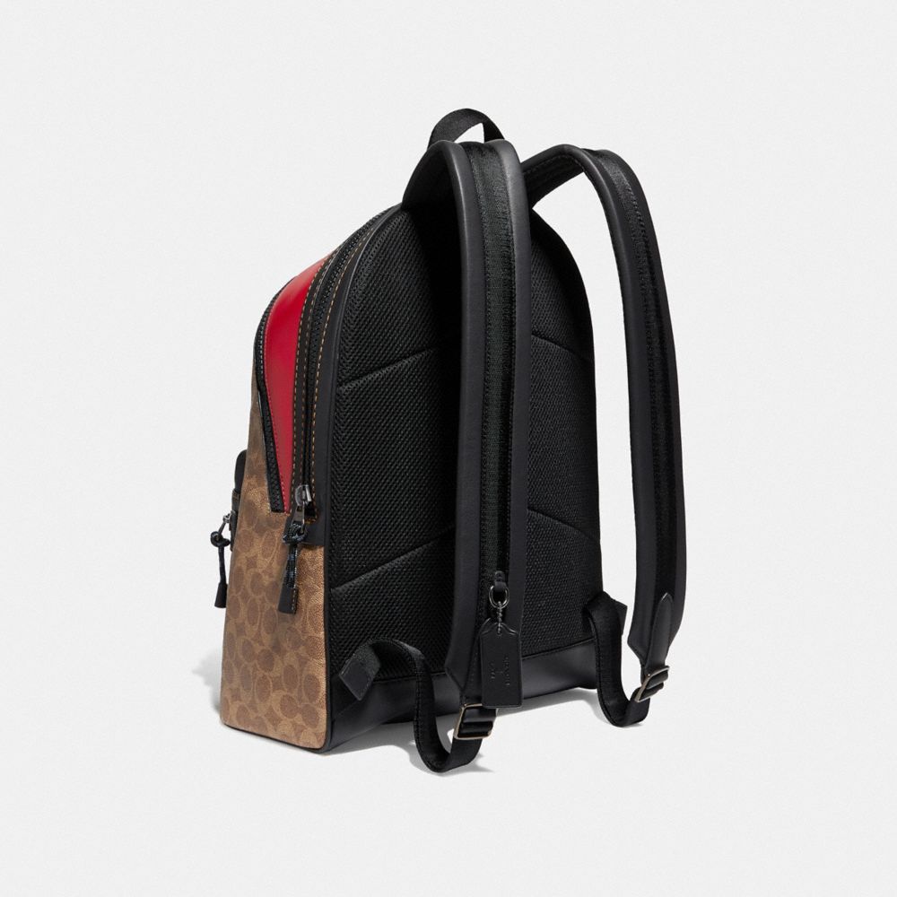 COACH®,Academy Backpack In Signature Canvas With Rexy By Sui Jianguo,,Angle View