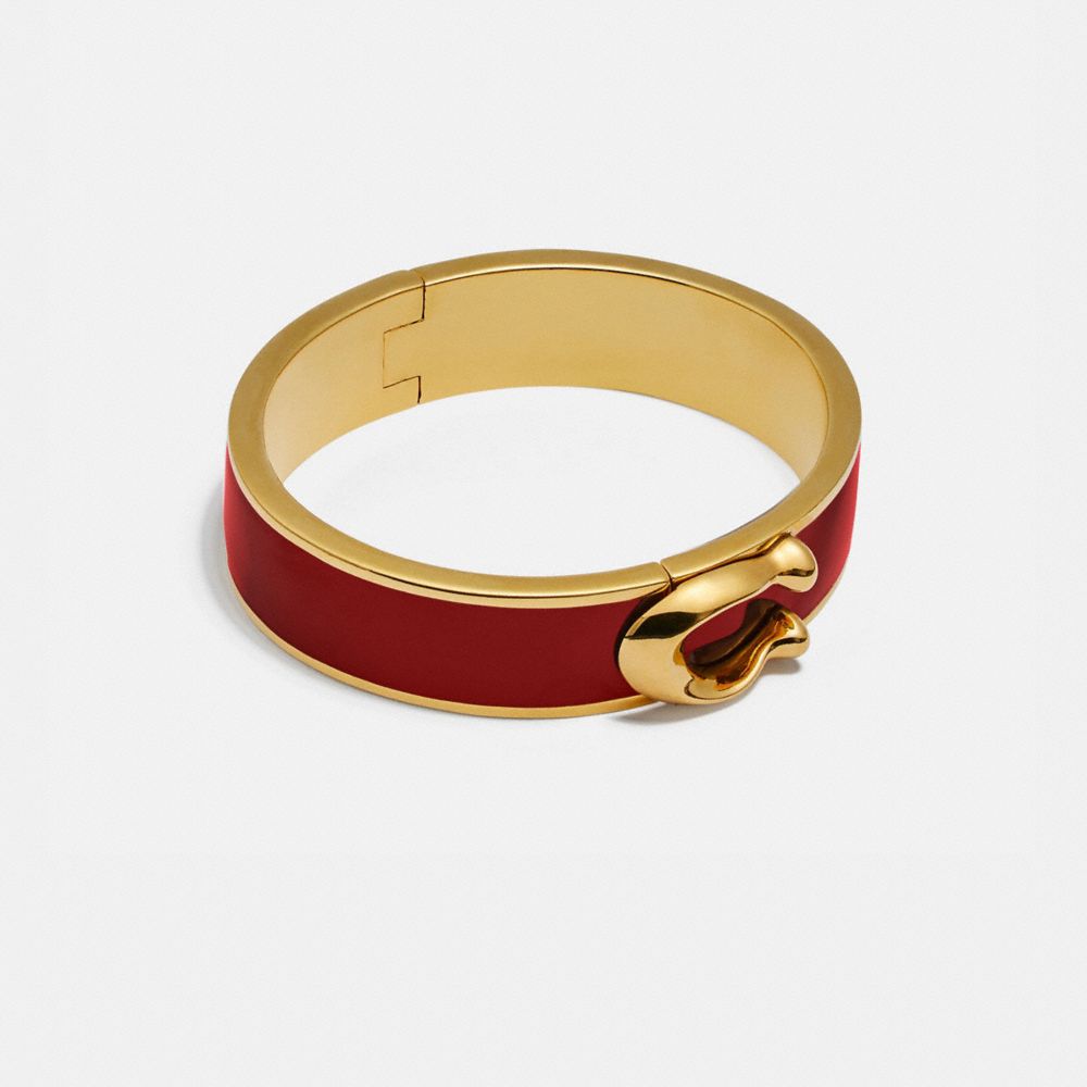 COACH®,SIGNATURE LARGE HINGED BANGLE,Plated Brass,Gold/Red,Front View