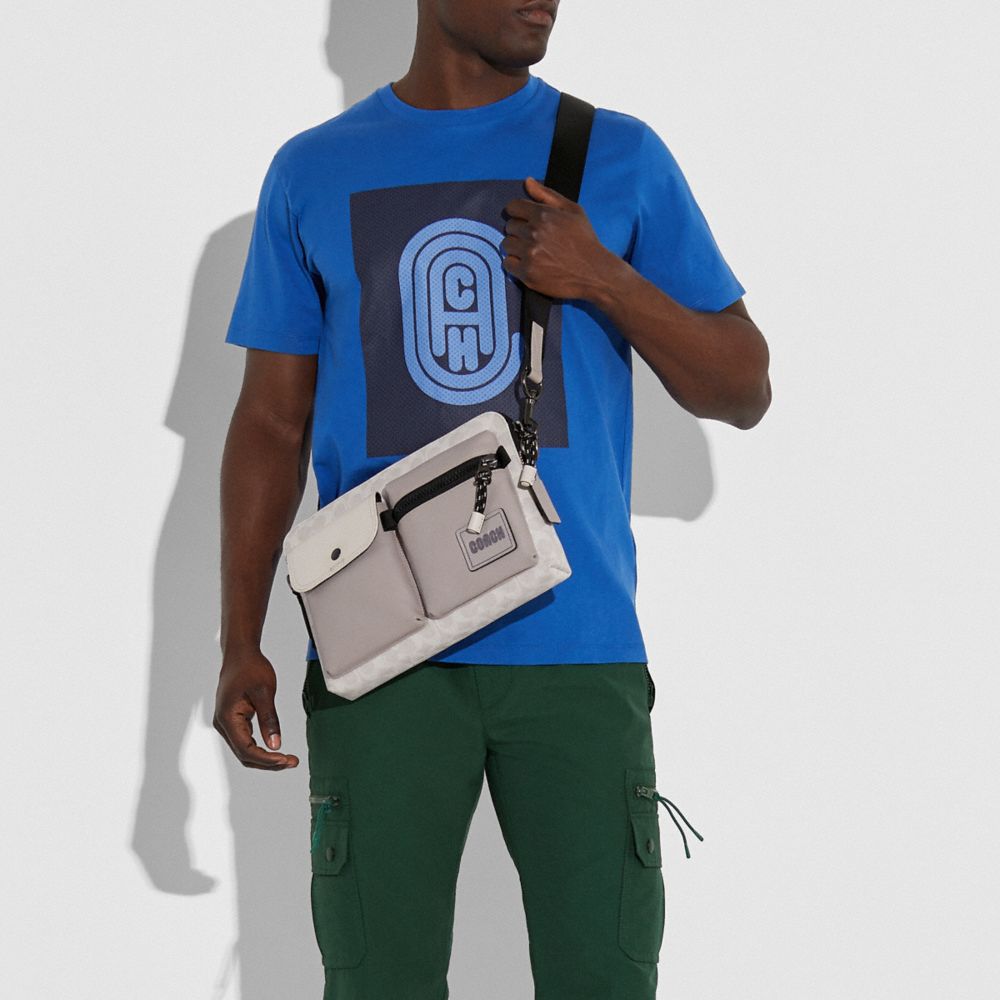 Pacer crossbody in signature online canvas with coach patch