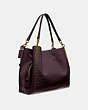 COACH®,DALTON BAG 31 IN SIGNATURE LEATHER WITH RIVETS,Leather,Medium,Brass/Oxblood,Angle View